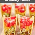 homemade Taco Bell crunchy tacos on a wood board.