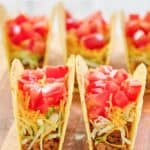 copycat Taco Bell crunchy tacos on a wood board.