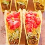 copycat Taco Bell crunchy tacos on a wood board.