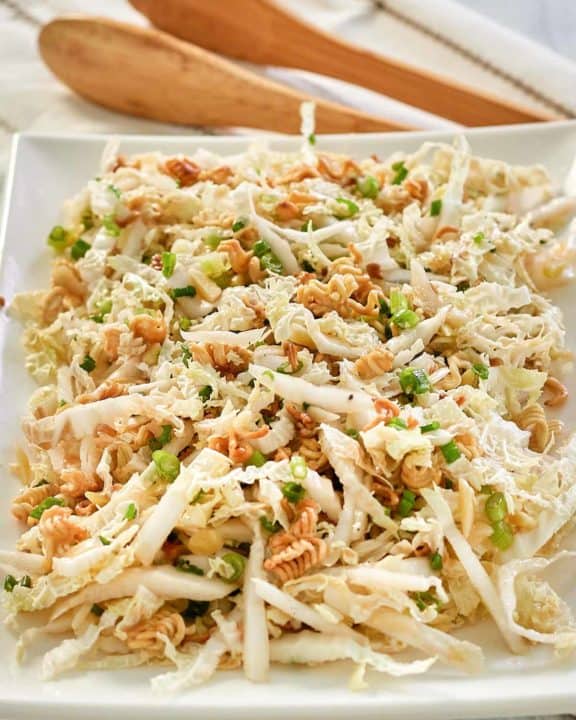 Asian slaw with ramen noodles on a platter.