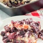 blackberry cobbler on a plate and in a baking pan.