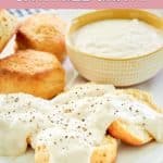 homemade Cracker Barrel sawmill gravy over biscuits and in a bowl.