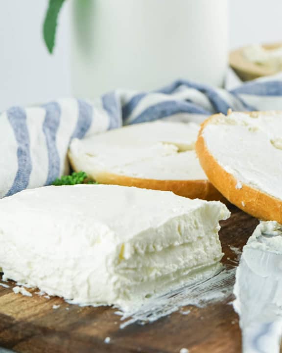 block of homemade cream cheese and bagels.