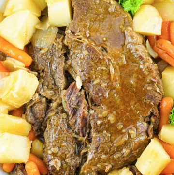 overhead view of Instant Pot pot roast with gravy and vegetables.