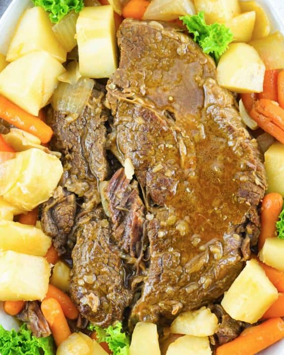 overhead view of Instant Pot pot roast with gravy and vegetables.