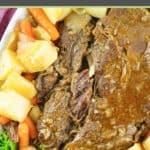 Instant Pot pot roast with gravy and vegetables on a platter.