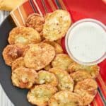 overhead view of homemade mojo potatoes and dipping sauce.