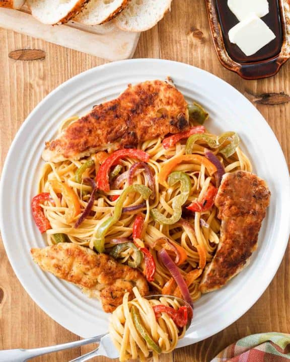 overhead view of copycat Olive Garden chicken scampi on a plate.
