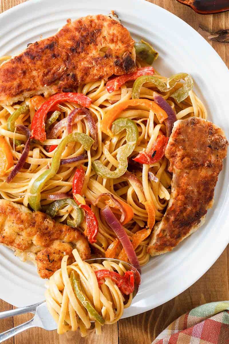 copycat Olive Garden chicken scampi on a white plate.