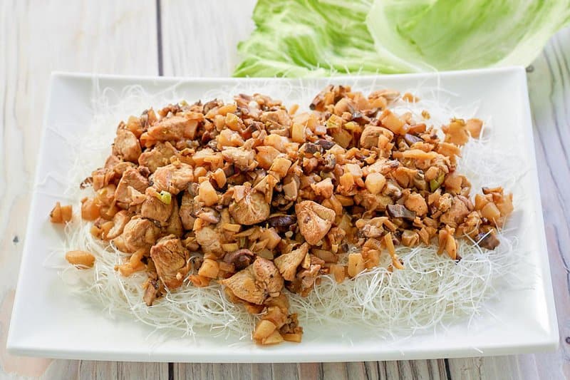 copycat PF Chang's chicken lettuce wraps over cellophane noodles.