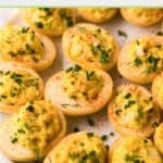 smoked deviled eggs on a white platter.