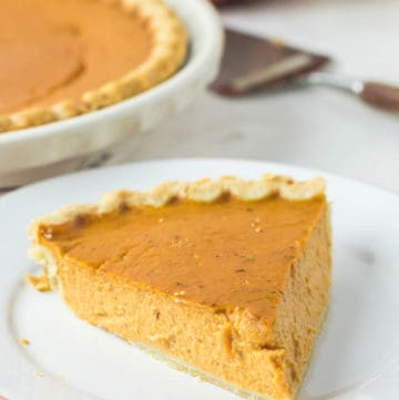 sugar free pumpkin pie slice on a plate.