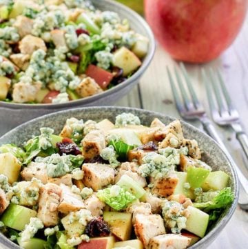 bowls of copycat Wendy's apple pecan salad with chicken.
