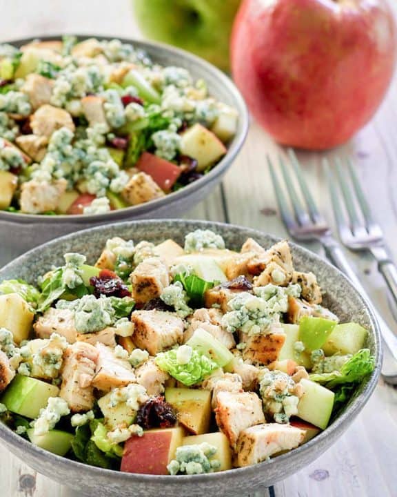 bowls of copycat Wendy's apple pecan salad with chicken.