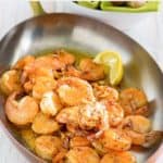 homemade Bubba Gump shrimp in an oval skillet.