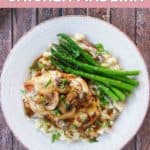 chicken madeira, potatoes, and asparagus on a plate.