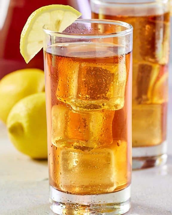 copycat Chick Fil A sweet tea garnished with lemon.