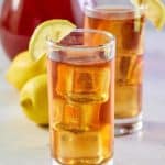 copycat chick fil a iced sweet tea with a lemon garnish.