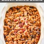 homemade cracker barrel baked beans with bacon in a dish.
