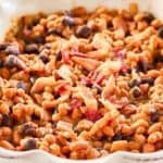 homemade cracker barrel bacon baked beans in a dish.