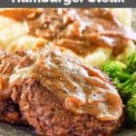 closeup of homemade Cracker Barrel hamburger steak and gravy.