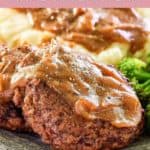 homemade Cracker Barrel hamburger steaks smothered in gravy.