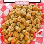 southern fried okra in a basket lined with parchment.