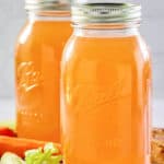 Instant Pot beef bone broth in two mason jars.