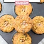 oatmeal raisin muffins in a muffin tin.