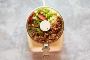 meat and cheese in a food processor.