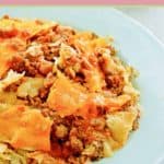close up of taco casserole serving on a plate.