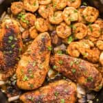 copycat Applebee's Bourbon Street chicken and shrimp in a skillet.