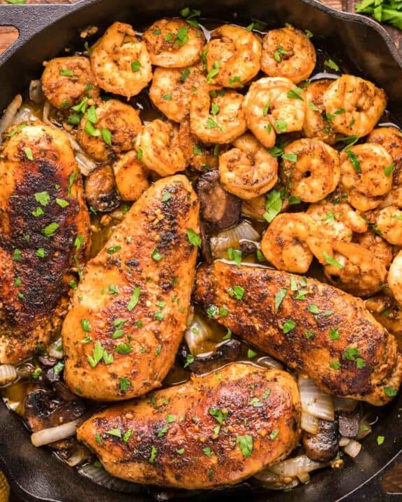 copycat Applebee's Bourbon Street chicken and shrimp in a skillet.