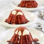three homemade Chili's molten lava cake desserts and spoons.