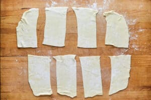 pizza dough rolled out and cut into rectangles.