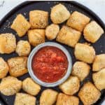 overhead view of homemade Rosati's dough nuggets with sauce.