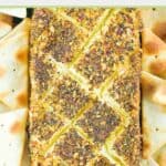 overhead view of smoked cream cheese block and crackers.