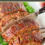 cutting a smoked meatloaf into slices with a knife.