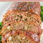 slices of smoked meatloaf on a platter.