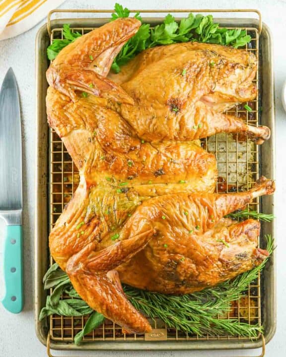 overhead view of a smoked spatchcock turkey.
