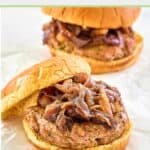 two turkey burgers on parchment paper.