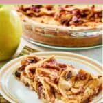 apple pie cheesecake slice on a plate.