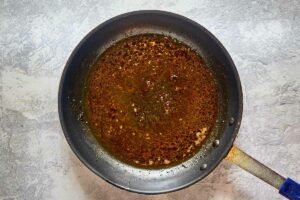 deglazing pan with chicken stock for chicken dijon.