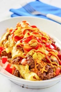 copycat IHOP cheeseburger omelette on a white plate.