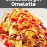 closeup of homemade IHOP cheeseburger omelette on a plate.