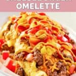 homemade IHOP cheeseburger omelette on a white plate.