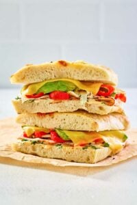 copycat Panera chipotle chicken avocado melt on parchment paper.