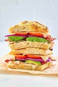 copycat Panera frontega chicken sandwich on parchment paper.