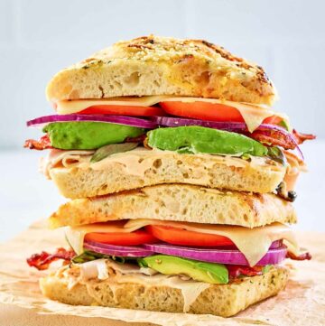 copycat Panera frontega chicken sandwich on parchment paper.