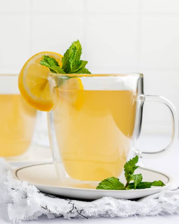 copycat Starbucks medicine ball honey citrus mint tea drink with fresh lemon and mint garnish.